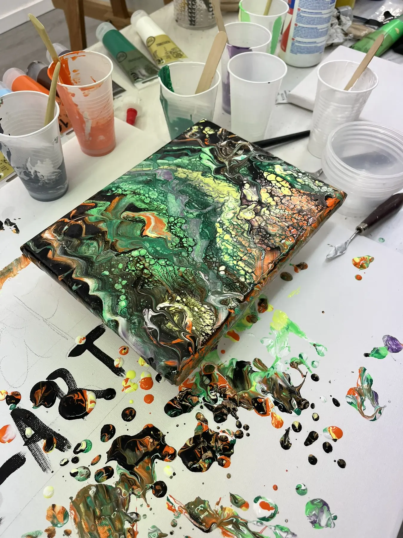 Abstract painting and materials from an art therapy class